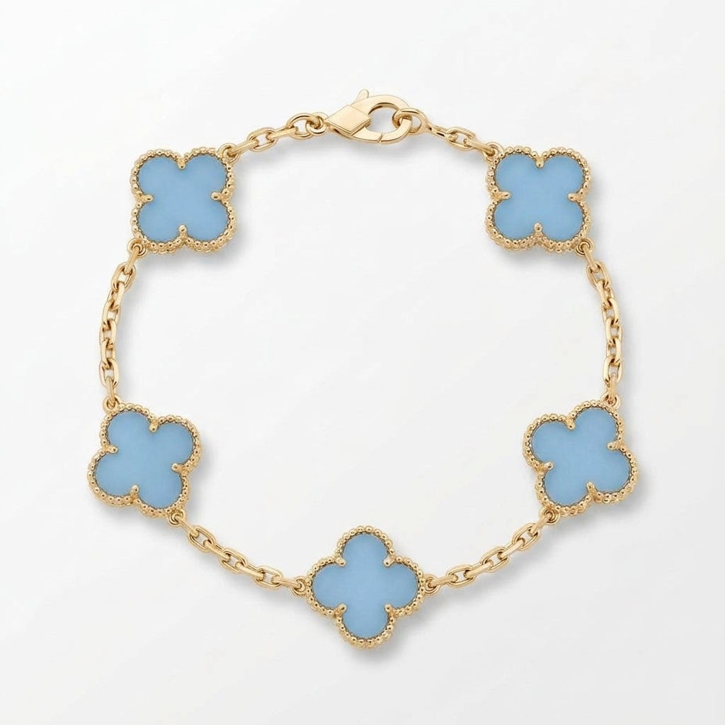 Pulsera trébol dorado celeste