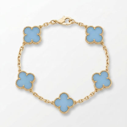 Pulsera trébol dorado celeste